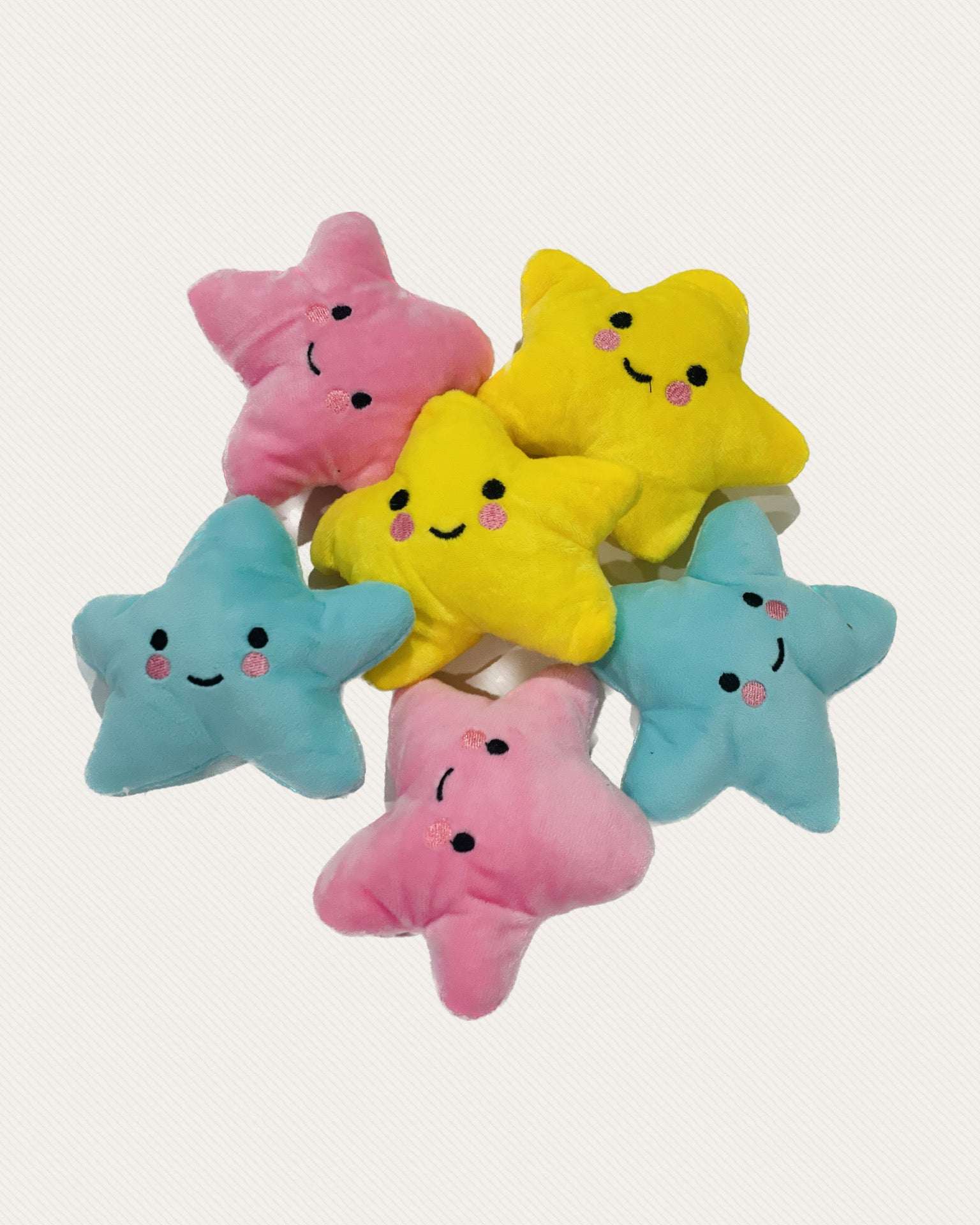 Engaging puppy toys set with colorful squeaky plush stars for small dogs.